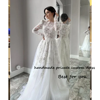 Белые свадебные платья с длинным рукавом и круглым вырезом, цветочная аппликация, тюлевое платье невесты трапециевидной формы со шлейфом, элегантные свадебные платья из Дубая